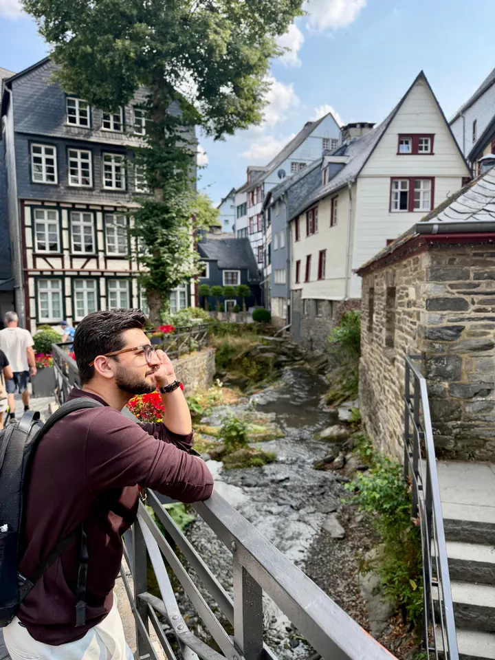 Half-timbered, with a river running straight through the middle of it.